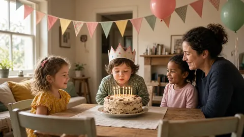 A child in a paper crown blows out birthday candles as family gather round the table